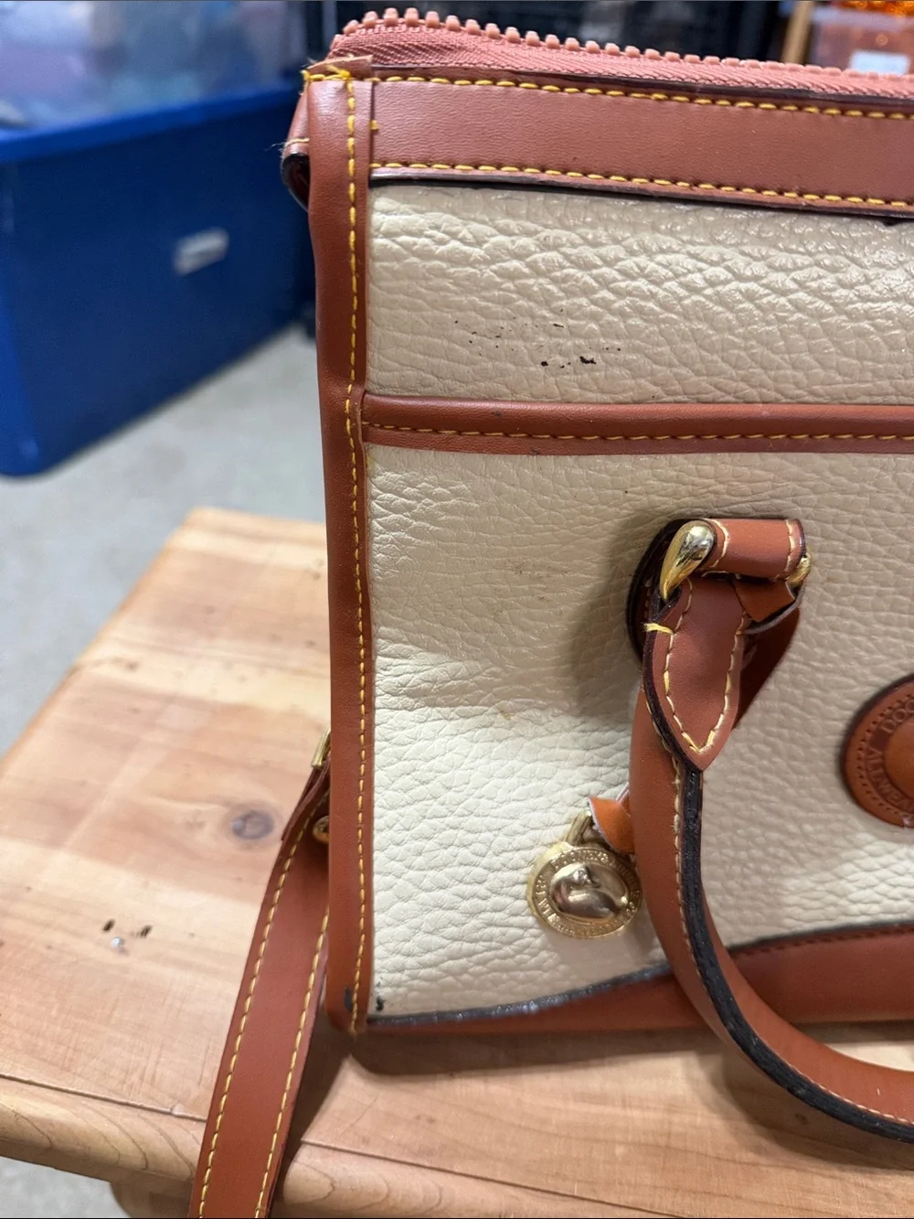 Dooney & Bourke Cream Leather Satchel with Brown Trim